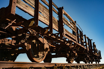 Old and rusty train wagons in a sunny day.