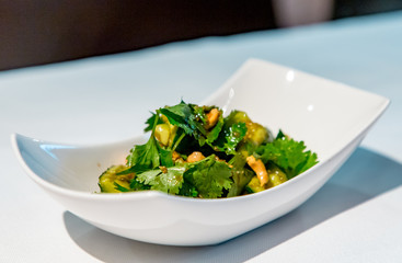 Chinese cuisine. Broken cucumbers with nuts.