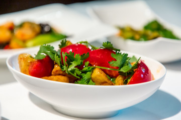 Chinese cuisine. fresh tomatoes and fried eggplant.