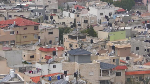 Skyline of Umm El Fahm, an Arab town with citizens of Israel. Umm al-Fahm is the social, cultural and economic center for residents of the Wadi Ara and Triangle regions.