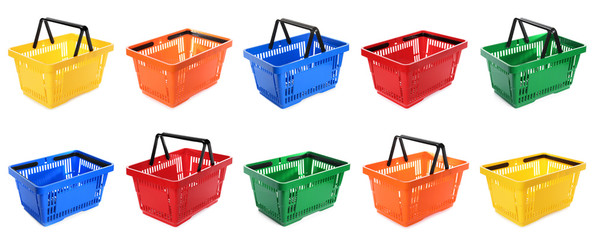 Set of different plastic shopping baskets on white background