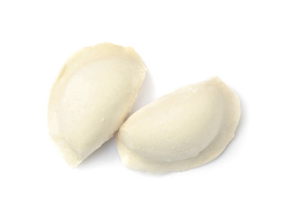 Raw dumplings on white background, top view