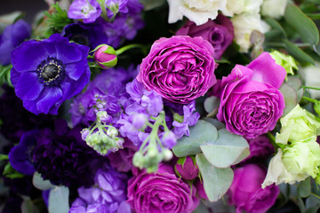 Close up view of beautiful flowers mix in the box. Unpacking and deliver flowers. Small business.