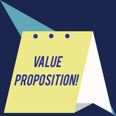 Writing note showing Value Proposition. Business concept for service make company or product attractive to customers Modern fresh and simple design of calendar using folded paper material