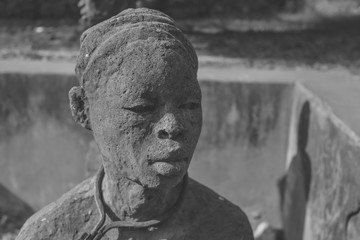 Naklejka premium Statue of black man in Africa