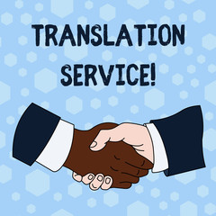 Word writing text Translation Service. Business photo showcasing the Equivalent Target Language from the Mother Tongue Hand Shake Multiracial Male Business Partners Colleagues Formal Shirt Suit