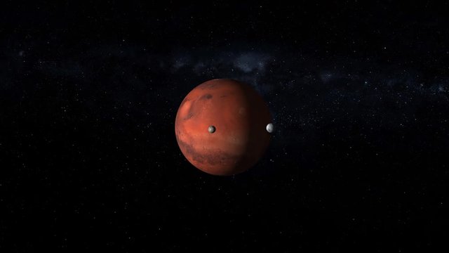 Space travel to planet Mars rotating with two satellite moons Phobos and Deimos, milky way stars in background. Contains public domain image by Nasa
