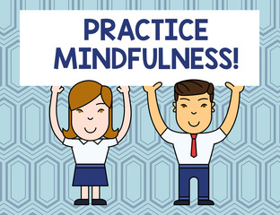 Text sign showing Practice Mindfulness. Business photo showcasing achieve a State of Relaxation a form of Meditation Two Smiling People Holding Big Blank Poster Board Overhead with Both Hands