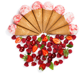  Flat lay concept of ice cream cones and berries.