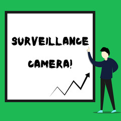 Writing note showing Surveillance Camera. Business concept for Closed Circuit Television transmit signal on monitors Young man standing pointing up rectangle Geometric background