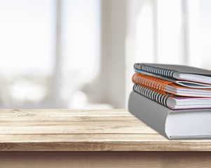 Collection of old books stack on blurred  background