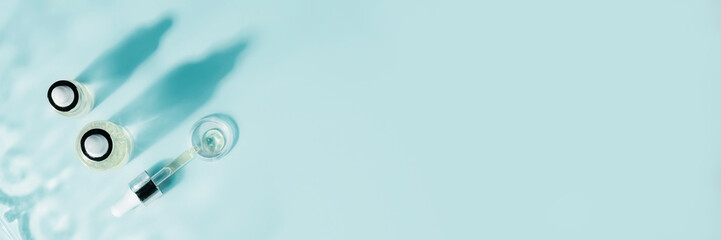 Hyaluronic acid, botulin, serum in vials. Concept of cosmetic surgery for facial rejuvenation.