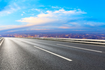 Empty highway road and modern city skyline in Shanghai,China