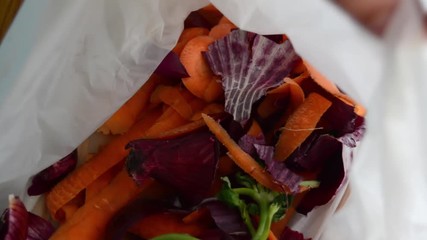 packing organic wate in biodegradable white bags