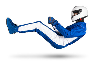 Race driver in blue white motorsport overall hover over ground in driving seat position with shoes...