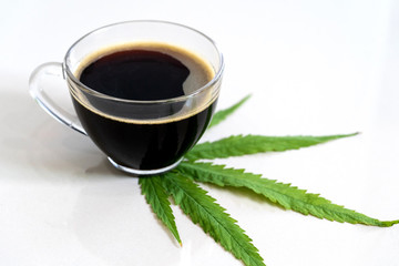 Black coffee with Cannabis(marijuana) leaves.