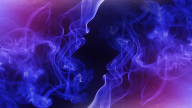 Mystical Blue and Purple Smoke Diagonal 4K Loop features blue and purple hued smoke crawling across the corners of the screen in a diagonal with light streaming in from corners in a loop