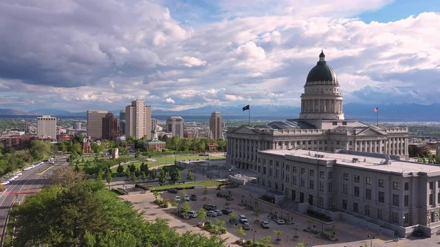Aerial view flying toward downtown Salt Lake City Utah viewing Temple Square.