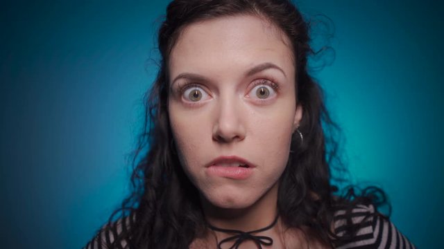 dark hair woman deeply confused and astonished