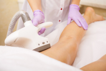 Body Care. Woman is in the process at the clinic lipomassage