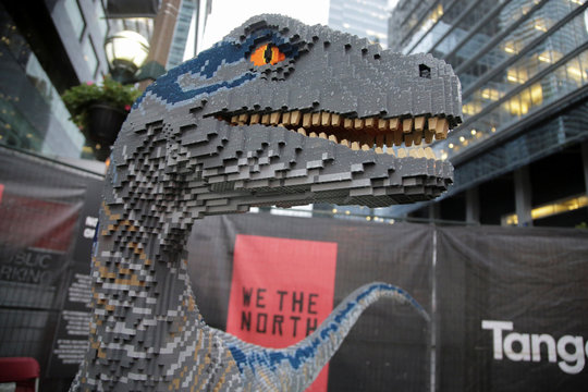 A Raptor Dinosaur Made Of Lego Is Shown In The Jurassic Park Fan Zone Outside The Arena Where Game 5 Of The Nba Finals Between The Toronto Raptors And The Golden State