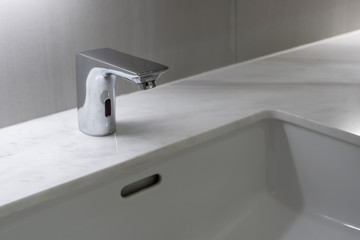 Modern faucet with marble washbasin sink interior contemporary