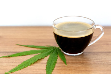 Black coffee with Cannabis(marijuana) leaves.