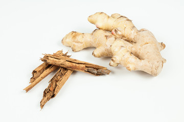 Ginger root and cinnamon ; photo on neutral background