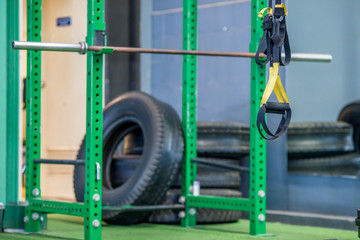 The background of the exercise equipment set for good health (steel balls, dumbbells, cable, weightlifting, boxing boxing gloves, fitness balls) has a blurred light that Fall 
