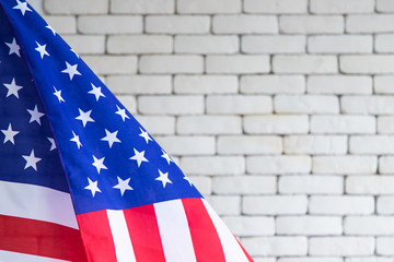 American flag on white brick wall background, 4th of July, Independence day, Memorial day.