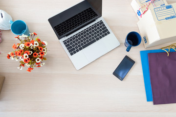 Packing accessories at workplace of startup small business owner, cardboard parcel box for online...