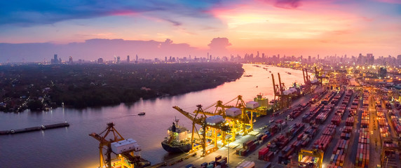 Logistics and transportation of Container Cargo ship and Cargo plane with working crane bridge in...