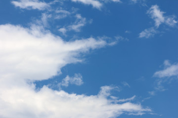 Obraz na płótnie Canvas blue sky background and white clouds soft focus