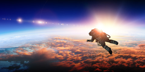 Astronaut in space on planet orbit.