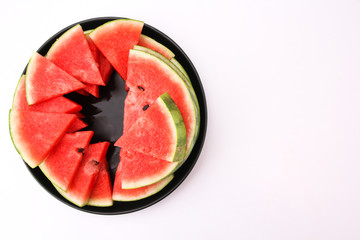 Watermelon on a white backdrop in the studio.