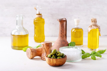 Fototapeta na wymiar Olive oil in glass bottles