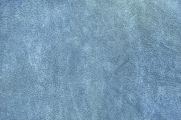 Texture of blue suede. Matte surface of pigskin suede jacket.  Close-up. 