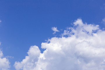 Blue sky and white clouds, rain clouds on sunny summer or spring day.