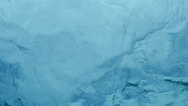Okinawa,Japan-June 1, 2019: Blue sea water surface of Okinawa viewed underwater