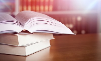 Collection of old books  on background
