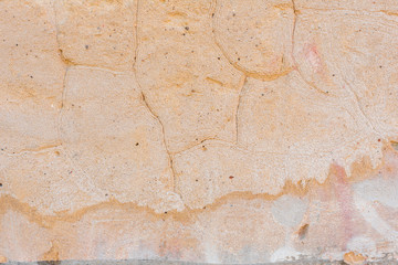 Texture, wall, concrete, it can be used as a background. Wall fragment with scratches and cracks