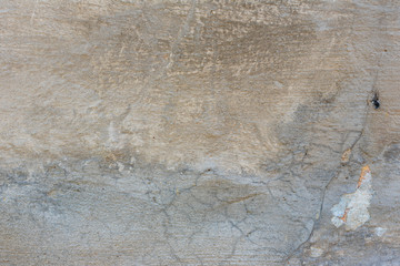 Texture, wall, concrete, it can be used as a background. Wall fragment with scratches and cracks