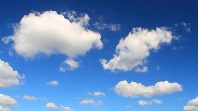 blue sky with white clouds,flight over the clouds a sunny day with strong wind