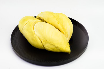 Durian on the plate isolated on white background