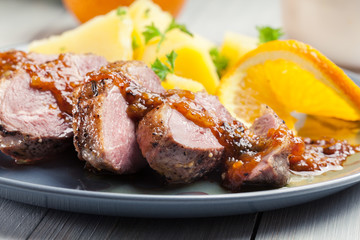 Roast duck breast with orange sauce