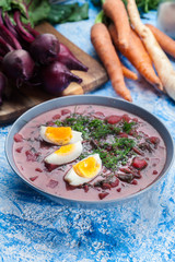 Beetroot soup served with boiled egg