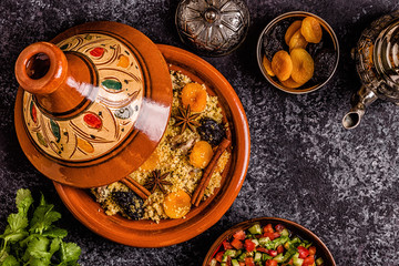 Traditional moroccan tajine of chicken with dried fruits and spices.