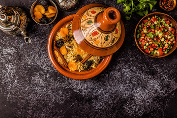 Traditional moroccan tajine of chicken with dried fruits and spices.