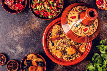 Traditional moroccan tajine of chicken with dried fruits and spices.