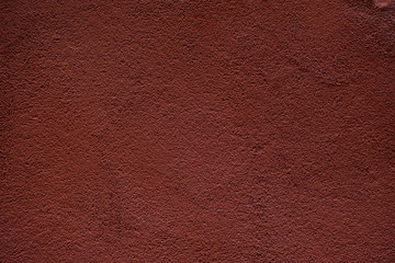 Red wall of plaster.